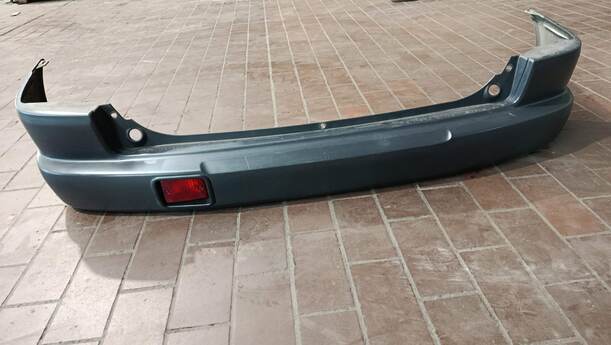 Foto: STOSSFÄNGER/ STOßSTANGE HINTEN ( UNLACKIERT ) eines Mazda Demio 1.4