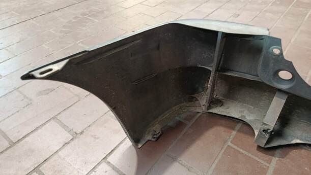 Foto: STOSSFÄNGER/ STOßSTANGE HINTEN ( UNLACKIERT ) eines Mazda Demio 1.4