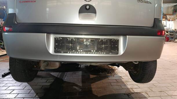 Foto: STOSSFÄNGER/ STOßSTANGE HINTEN ( VOR FACELIFT ) eines Opel Corsa 1.0 12V