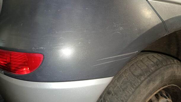 Foto: STOSSFÄNGER/ STOßSTANGE HINTEN ( VOR FACELIFT ) eines Opel Corsa 1.0 12V