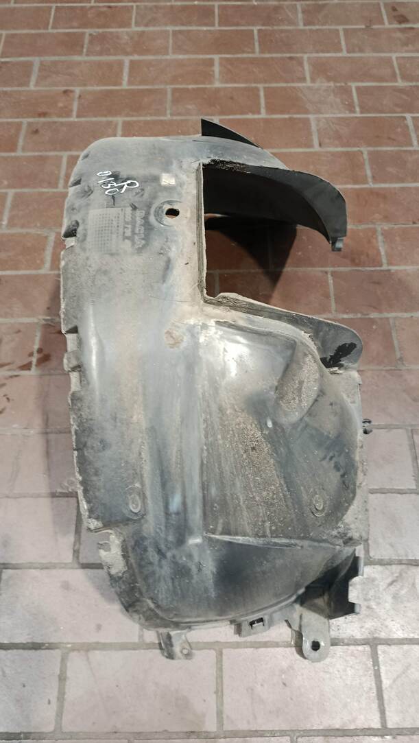 Foto: RADHAUSSCHALE / INNENKOTFLÜGEL RECHTS eines Dacia Sandero 1.4 MPI