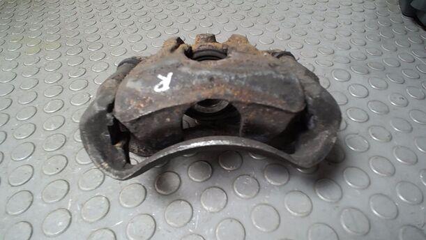 Foto: BREMSSATTEL VORN RECHTS eines Opel Corsa 1.0 12V