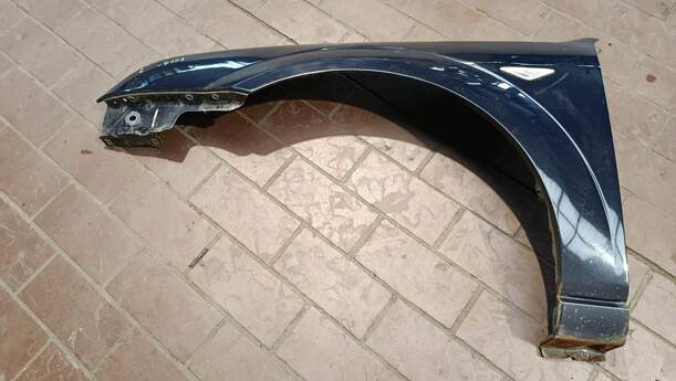 Foto: KOTFLÜGEL LINKS eines Ford Mondeo 2.0 Turnier TDDI