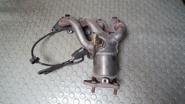 Foto: AUSPUFFKRÜMMER MIT KATALYSATOR eines VW Golf 1.4
