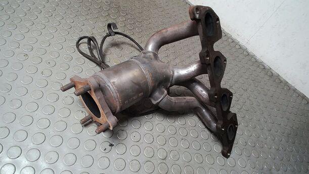 Foto: AUSPUFFKRÜMMER MIT KATALYSATOR eines VW Golf 1.4
