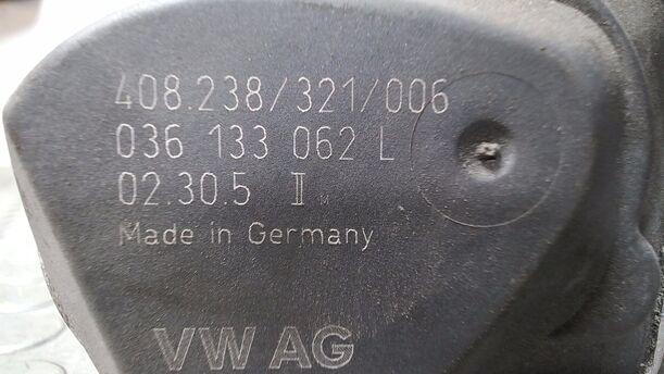 Foto: DROSSELKLAPPENSTUTZEN/ DROSSELKLAPPE eines VW Golf 1.4