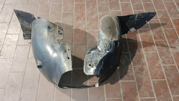 Foto: RADHAUSSCHALE / INNENKOTFLÜGEL VORNE RECHTS eines Peugeot 206 60