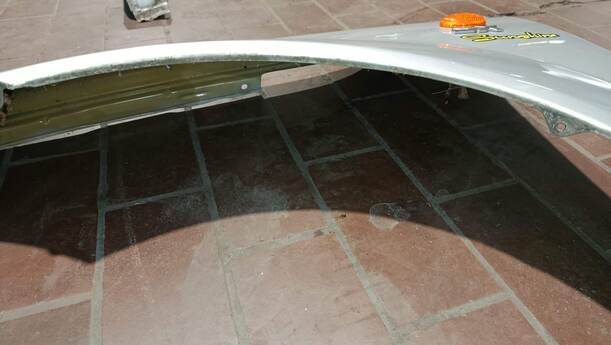 Foto: KOTFLÜGEL LINKS eines Chevrolet Kalos 1.4 16V