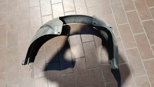 Foto: RADHAUSSCHALE/ INNENRADHAUS VORN LINKS eines Ford Fiesta 1.4