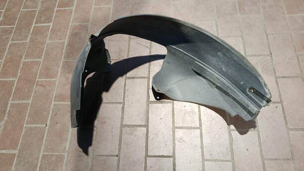 Foto: RADHAUSSCHALE/ INNENRADHAUS VORN LINKS eines Ford Fiesta 1.4