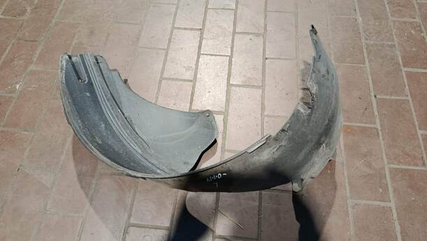 Foto: RADHAUSSCHALE/ INNENRADHAUS VORN LINKS eines Ford Fiesta 1.4