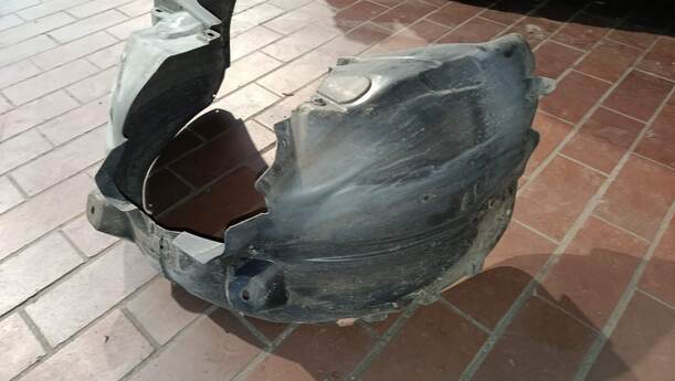 Foto: RADHAUSSCHALE/ INNENRADHAUS VORN LINKS eines Opel Corsa 1.4 16V GLS