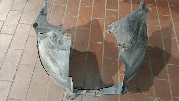 Foto: RADHAUSSCHALE/ INNENRADHAUS VORN LINKS eines Opel Corsa 1.4 16V GLS
