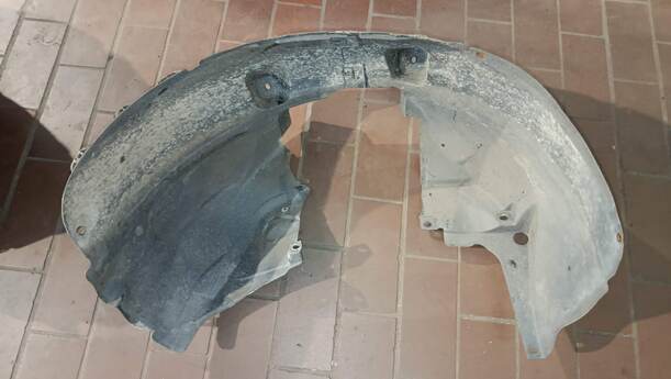 Foto: RADHAUSSCHALE/ INNENRADHAUS VORN RECHTS eines Opel Corsa 1.4 16V GLS