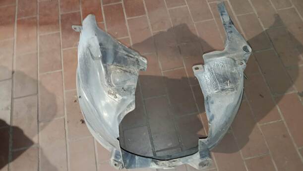 Foto: RADHAUSSCHALE/ INNENRADHAUS VORN RECHTS eines Opel Corsa 1.4 16V GLS