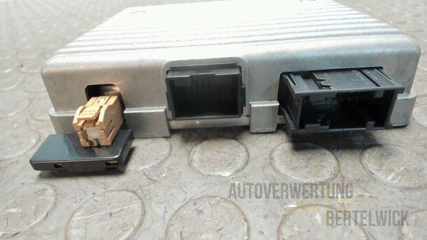 Foto: STEUERGERÄT TELEFON / FREISPRECHANLAGE eines Opel Astra 1.7 CDTI DPF Sports Tourer GLXi