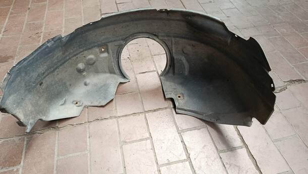 Foto: RADHAUSSCHALE / INNENKOTFLÜGEL VORNE LINKS eines Ford Mondeo Turnier