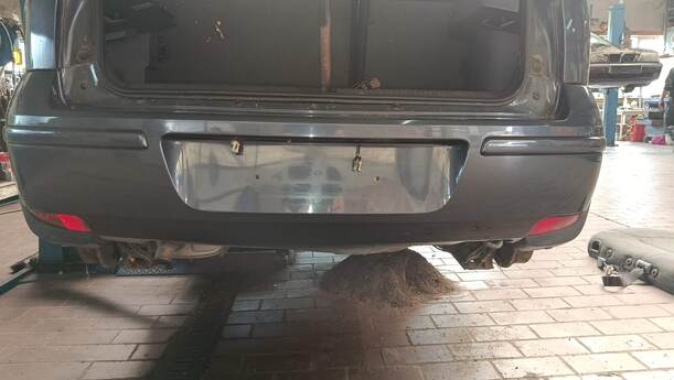 Foto: STOSSFÄNGER / STOßSTANGE HINTEN eines Opel Corsa 1.0 12V Attraction