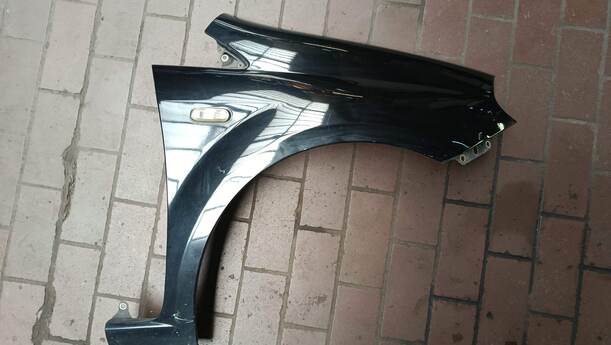 Foto: KOTFLÜGEL RECHTS eines Fiat Grande Punto 1.2 8V Special