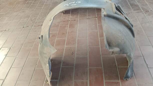 Foto: RADHAUSSCHALE/ INNENRADHAUS VORN LINKS eines Fiat Grande Punto 1.2 8V Special