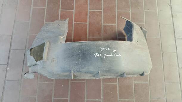 Foto: RADHAUSSCHALE/ INNENRADHAUS VORN LINKS eines Fiat Grande Punto 1.2 8V Special
