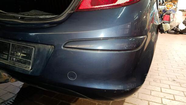 Foto: STOSSFÄNGER / STOßSTANGE HINTEN eines Opel Corsa 1.2 16V