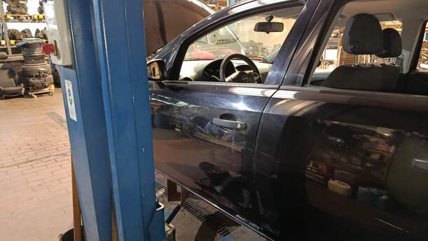 Foto: TÜR VORNE LINKS eines Opel Corsa 1.2 16V