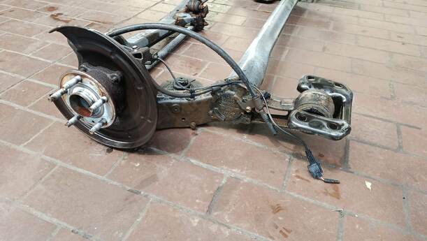 Foto: HINTERACHSE ( LIMOUSINE ) eines Opel Astra 1.4 Turbo ecoFLEX Start/Stop