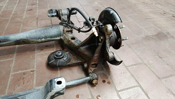Foto: HINTERACHSE ( LIMOUSINE ) eines Opel Astra 1.4 Turbo ecoFLEX Start/Stop