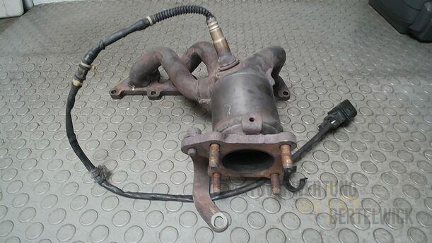 Foto: AUSPUFFKRÜMMER MIT KATALYSATOR eines VW Golf 1.4 Ghia