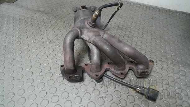 Foto: AUSPUFFKRÜMMER MIT KATALYSATOR eines VW Golf 1.4 Ghia