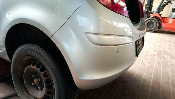 Foto: STOSSFÄNGER / STOßSTANGE HINTEN eines Opel Corsa 1.4 16V
