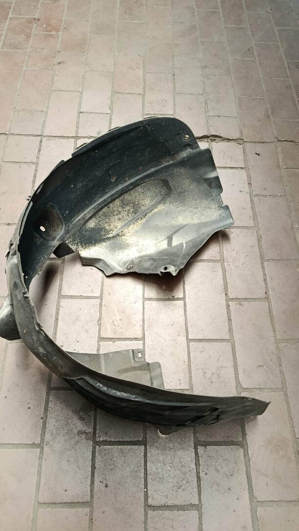 Foto: RADHAUSSCHALE / INNENKOTFLÜGEL LINKS eines Opel Corsa 1.4 16V