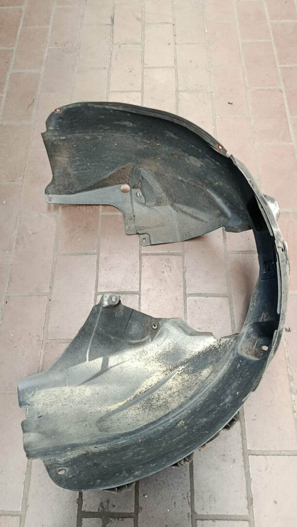 Foto: RADHAUSSCHALE / INNENKOTFLÜGEL LINKS eines Opel Corsa 1.4 16V