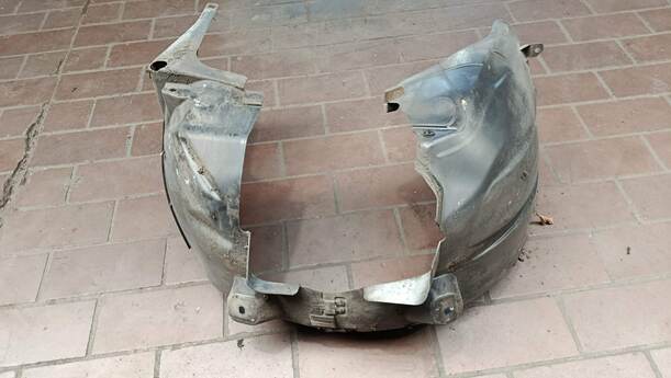 Foto: RADHAUSSCHALE / INNENKOTFLÜGEL LINKS eines Opel Corsa 1.4 16V
