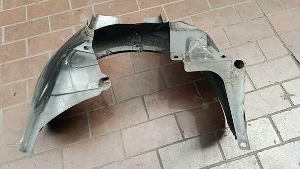 Foto: RADHAUSSCHALE / INNENKOTFLÜGEL LINKS eines Opel Corsa 1.4 16V