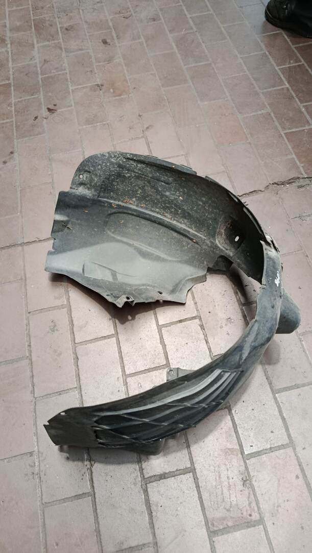 Foto: RADHAUSSCHALE / INNENKOTFLÜGEL RECHTS eines Opel Corsa 1.4 16V