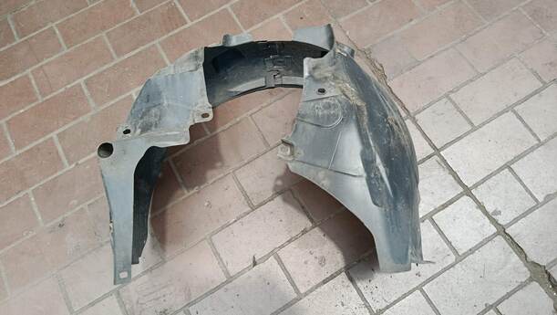 Foto: RADHAUSSCHALE / INNENKOTFLÜGEL RECHTS eines Opel Corsa 1.4 16V